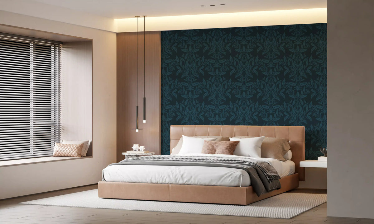Navy leaf wallpaper in a bedroom with a tan upholstered bed and window blinds GD12456