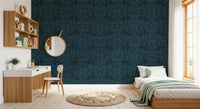 Navy leaf wallpaper in a study nook with white desk, round mirror and single bed GD12456