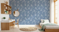 Minimalist scribble arrows muted blue wallpaper behind a kids desk and mint-throw bed GD12470
