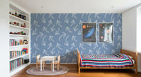 Blue scribble arrows wallpaper in a kids room with bookshelf and space posters GD12470