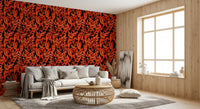 Fiery fronds wallpaper in a boho living room with cream sofa and wood accent wall GD12477