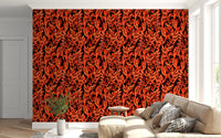 Tropical fronds wallpaper behind a cream sectional sofa by a bright window GD12477