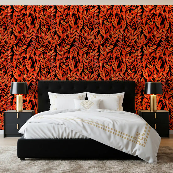 Fiery tropical fronds wallpaper behind a black bed with white bedding and gold lamps GD12477