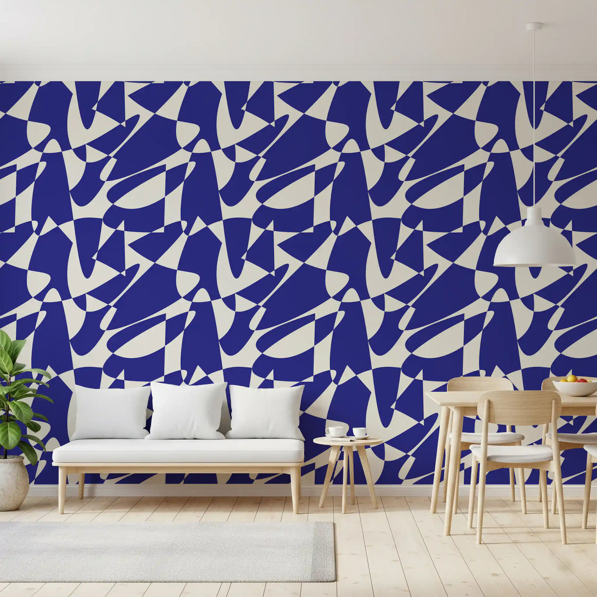 Blue geometric shapes wallpaper behind a white bench and a wooden dining table GD12480