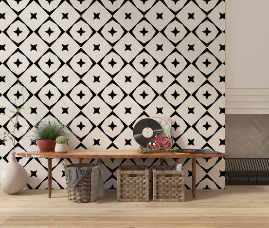 Monochrome geometric star grid wallpaper above a wooden console with plants and baskets GD12482