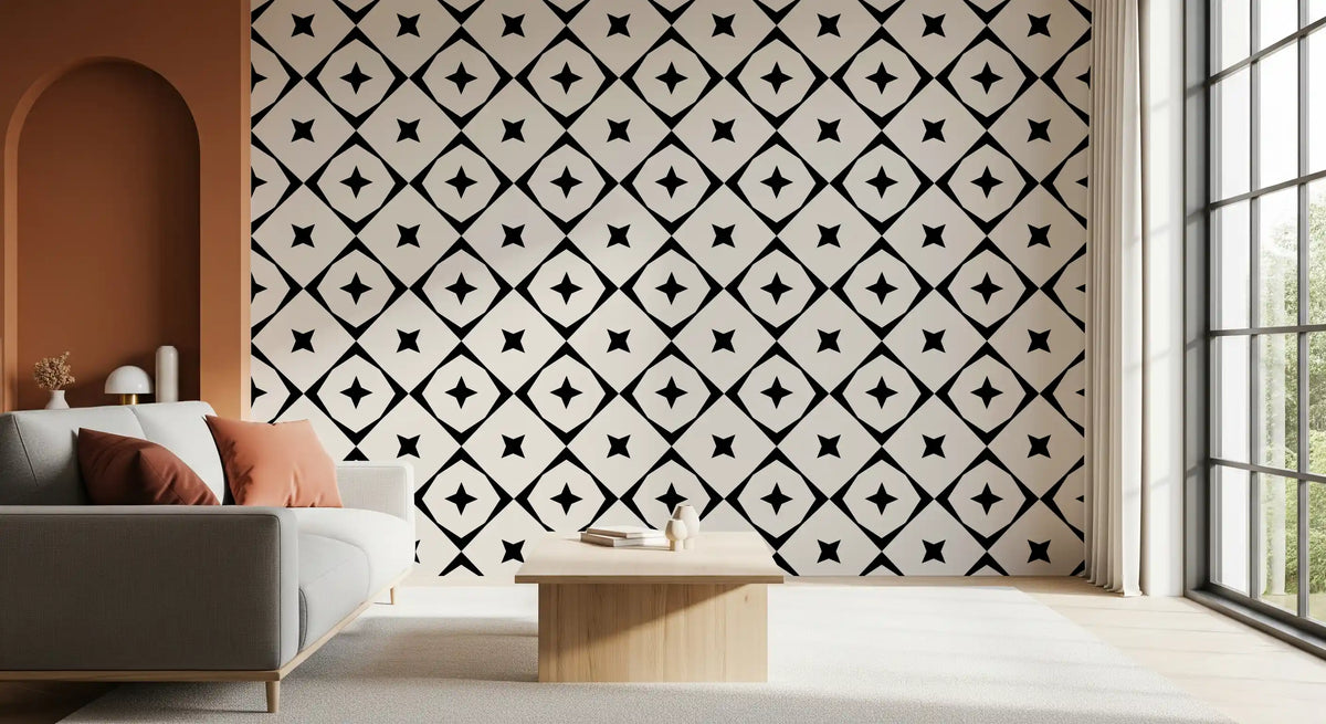 Black and white star grid wallpaper behind a grey sofa near a terracotta arched wall GD12482