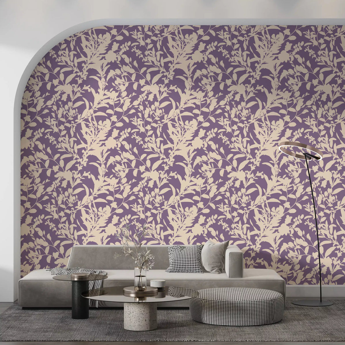 Cream botanical silhouette wallpaper behind a grey sofa in an arched alcove GD12484