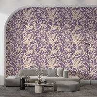 Cream botanical silhouette wallpaper behind a grey sofa in an arched alcove GD12484