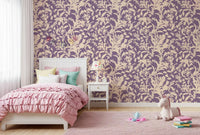Botanical silhouette wallpaper in a girls bedroom with a pink ruffled bed and toys GD12484