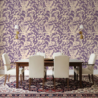 Botanical silhouette wallpaper in a dining room with cream chairs and a patterned rug GD12484