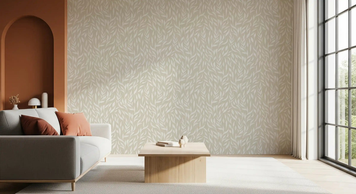 Botanical leaves wallpaper by a terracotta arched niche and grey sofa GD12486