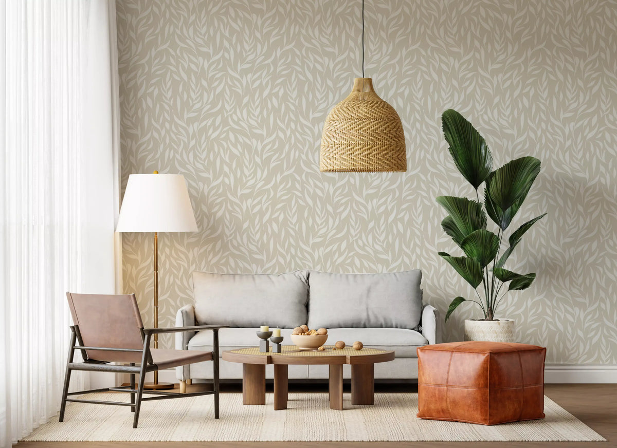 Cream botanical leaves wallpaper in a lounge with grey sofa and rattan pendant GD12486