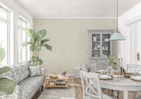 Serene botanical leaves wallpaper in a sunlit living and dining space GD12486