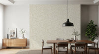 Cream leaf wallpaper in a dining room with dark wood table and sideboard GD12486