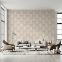 Beige sofas and armchairs in a bright living room with damask scroll wallpaper GD12492