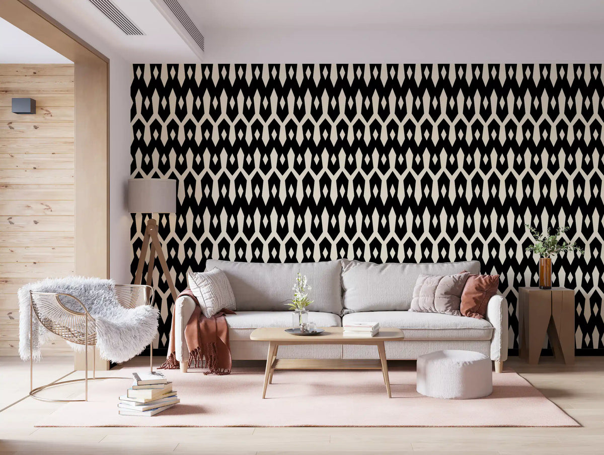 Living room with a grey sofa and pink throw on black and cream diamond wallpaper GD12494