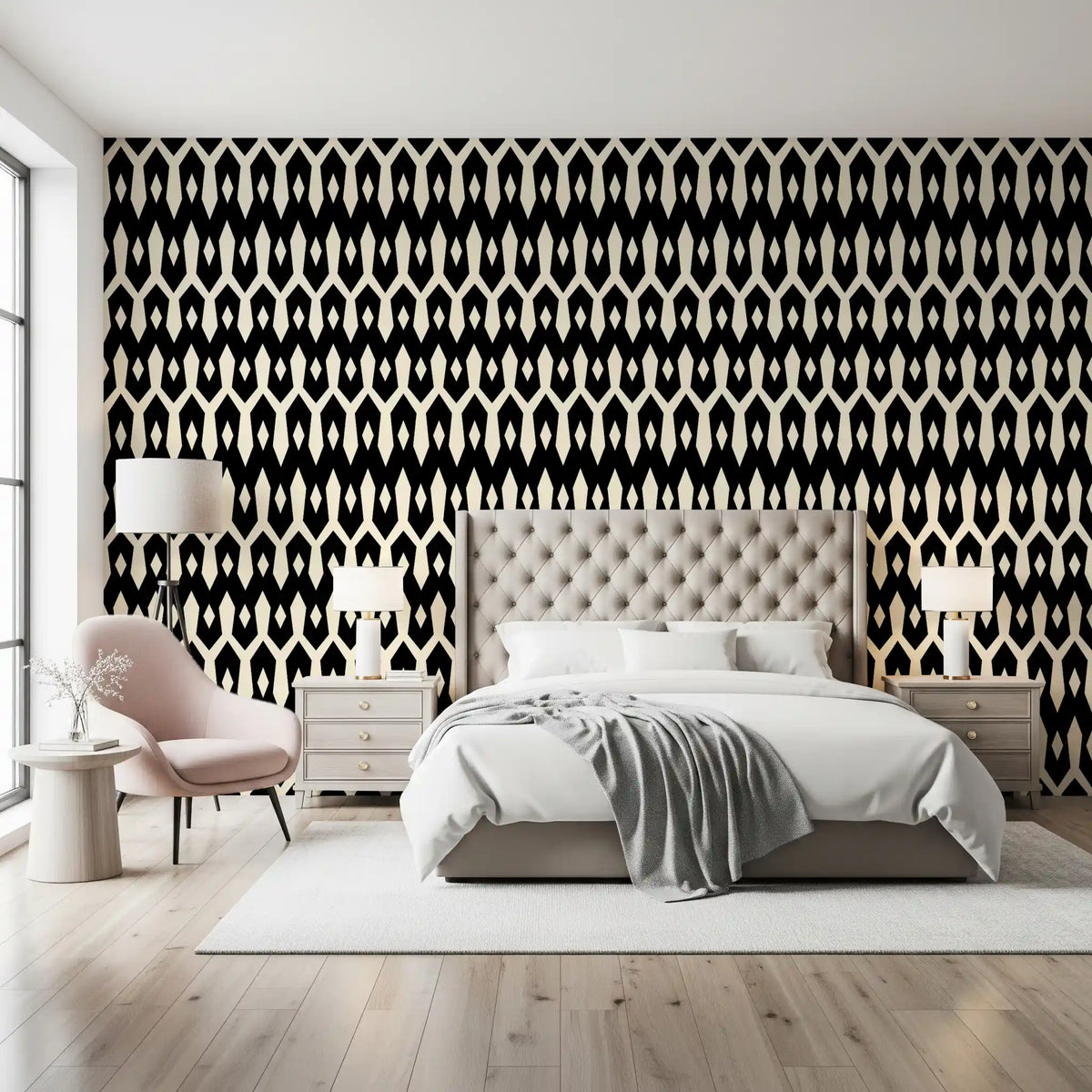 Black and cream diamond motif wallpaper in a bedroom with a pink accent chair GD12494