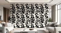 Monochrome circles wallpaper feature wall in a bright white living room GD12497