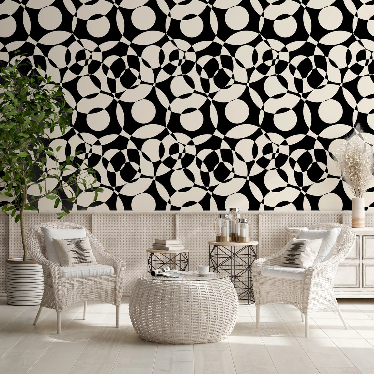 Interlocking circles wallpaper in a bright lounge with white armchairs and woven pouf GD12497