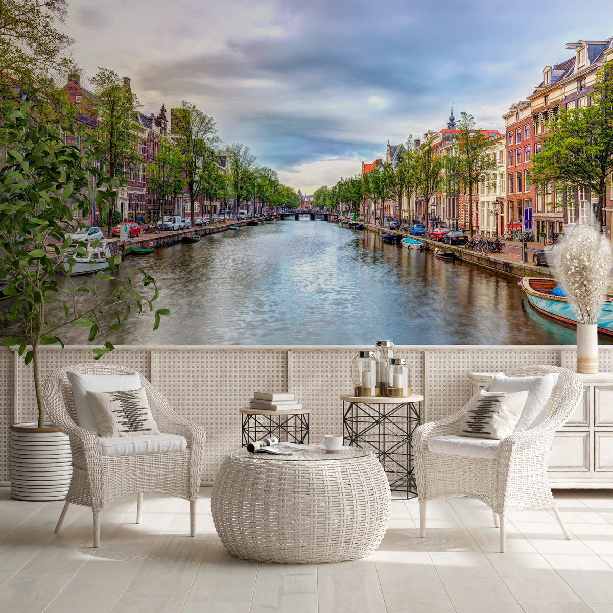 Historic Dutch townhouse canal wall mural on a balcony with white rattan chairs GD12632