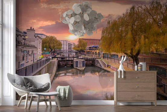 Sunset canal mural in a bedroom nook with a grey accent chair and wood dresser GD12635