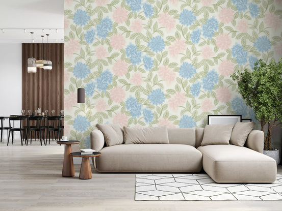 Watercolor hydrangea wallpaper behind a beige sectional and hexagon rug GD12644
