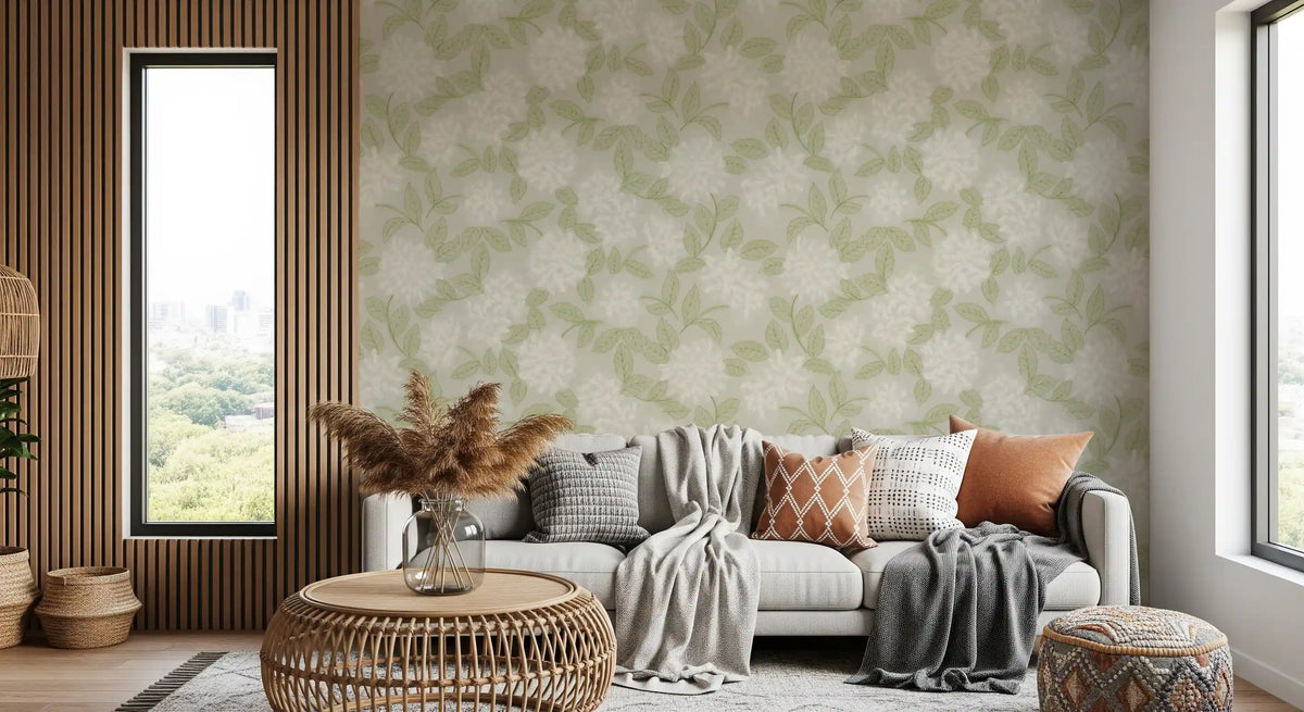 White bloom botanical wallpaper behind a grey sofa with pampas grass and wood slats GD12649