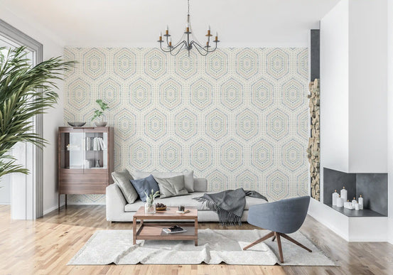 Grandmillennial boho hexagon wallpaper behind a white sofa and blue accent chair GD12654