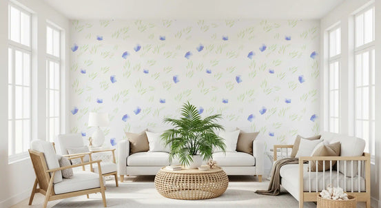 Minimalist blue petals wallpaper in a nursery with white sofa wood chairs and palm plant GD12678