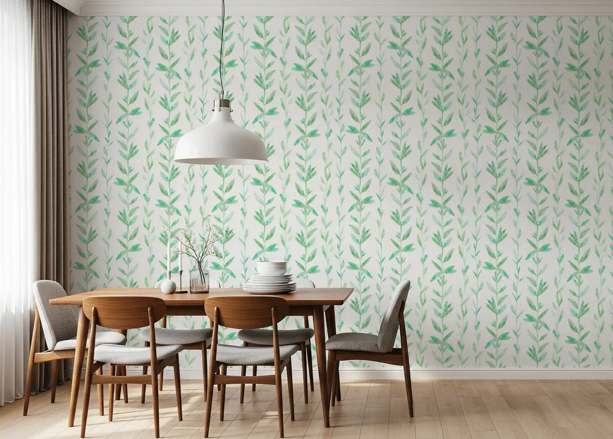 Watercolor fern vine wallpaper in a dining room with a wood table and pendant light GD12688