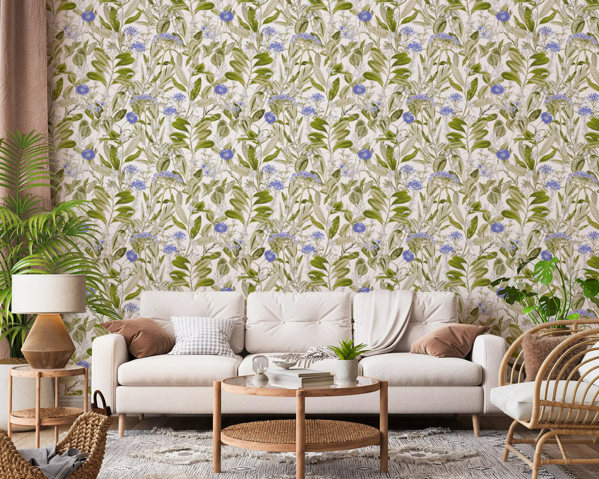 Meadow blue floral wallpaper in a living room with a cream sofa and leafy plants GD12694