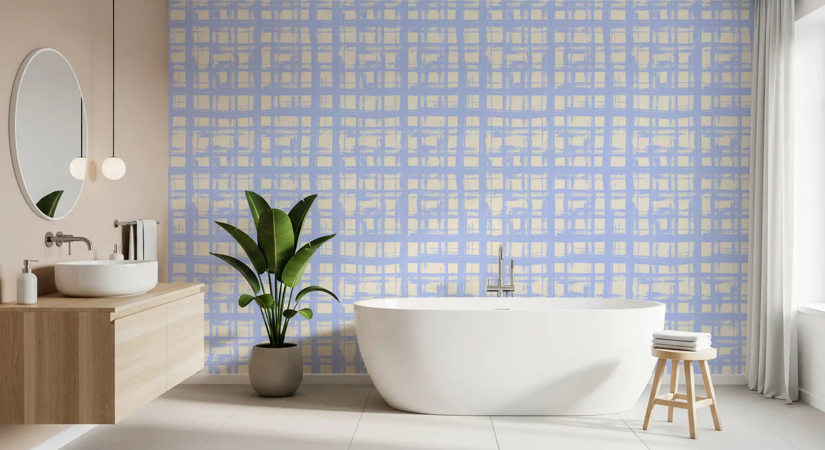 Cream and blue plaid wallpaper in a bathroom with a freestanding tub and wood vanity GD12695