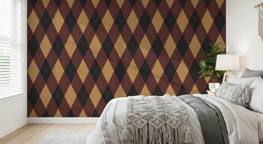 Argyle harlequin diamond wallpaper behind a white bed with a knit throw GD12726