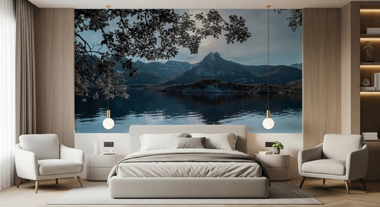 Arctic alpine reflection mural behind a grey bed with two white armchairs GD12781