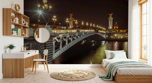 Paris bridge night mural in a bedroom with a wood desk and single bed GD12791
