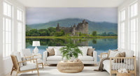 Misty Lochside Fortress Ruins Wall Mural