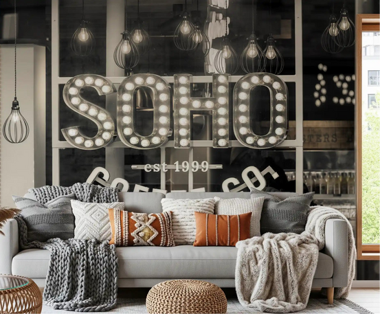 Metropolitan Coffee House Marquee wall mural behind a grey sofa with rust cushions GD12811