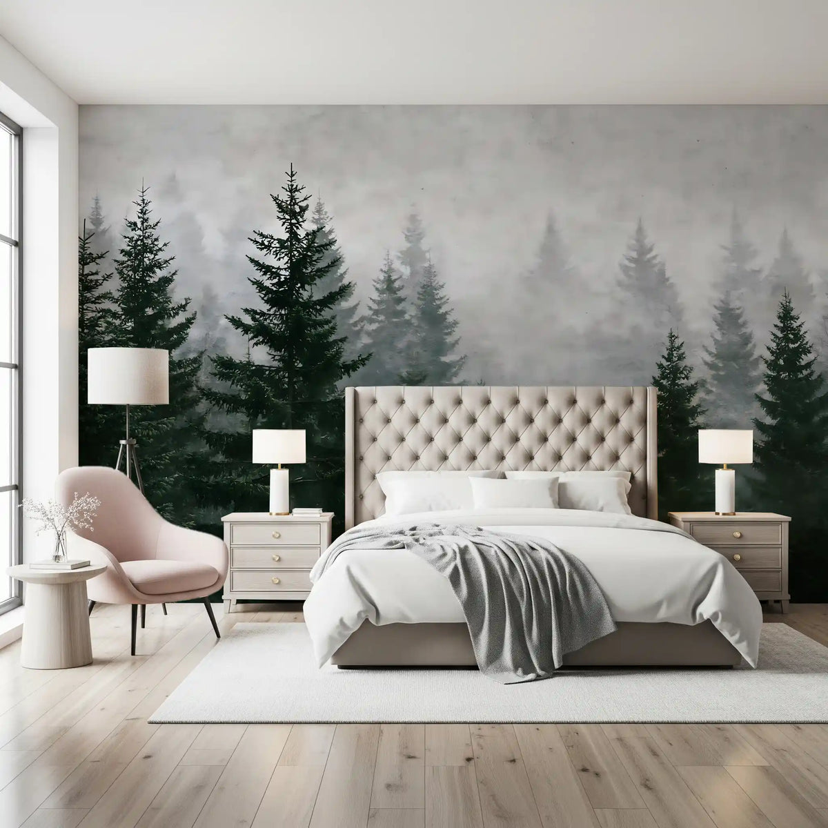 Evergreen wilderness fog wall mural behind a cream bed with a pink armchair GD12900