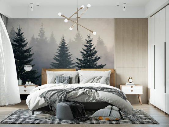 Winter woodland mist wall mural behind a wood-headboard bed with a grey throw GD12921