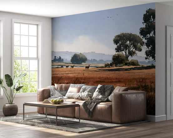 Serene meadow wildlife mural behind a brown leather sofa beside a bright window GD12951