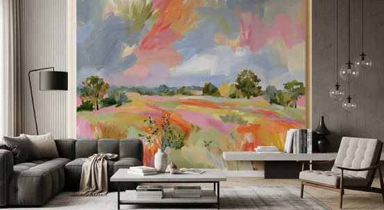Abstract painted meadow mural behind a grey sofa and cream accent chair GD12958