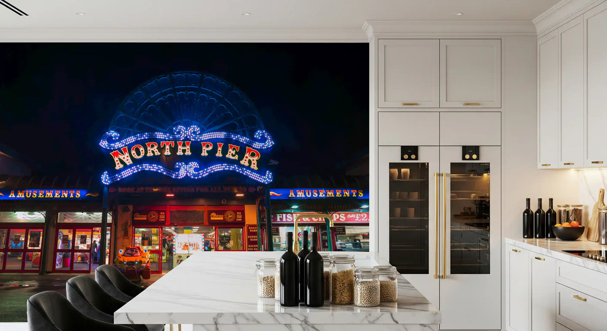 City wallpaper of the lit North Pier arcade behind a white kitchen island GD13031