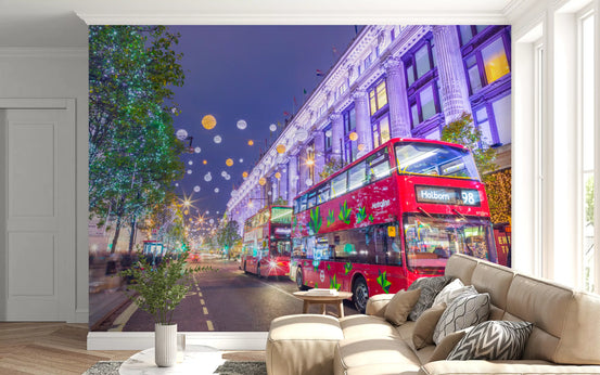 London wallpaper of a festive night street behind a living room sofa GD13045