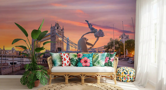 Living room with rattan chair and London wallpaper of Tower Bridge at a pink sunset GD13052
