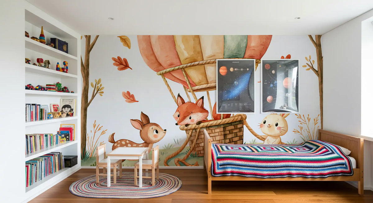 Hot air balloon wallpaper in a kids room with white bookshelf and a striped bed blanket GD13110