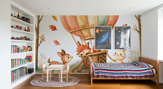 Hot air balloon wallpaper in a kids room with white bookshelf and a striped bed blanket GD13110