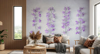 Lavender wallpaper above a cream sofa with patterned cushions and a rattan side table GD13138