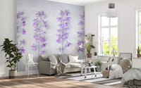 Purple flower stem wallpaper in a living room with a gray sofa and striped rug GD13138