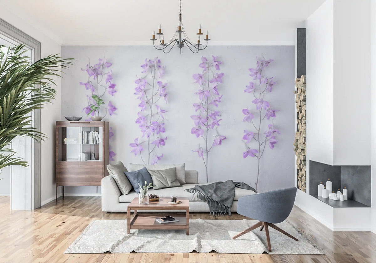 Delphinium stem wallpaper in a living room with a gray sofa, blue armchair and fireplace GD13138