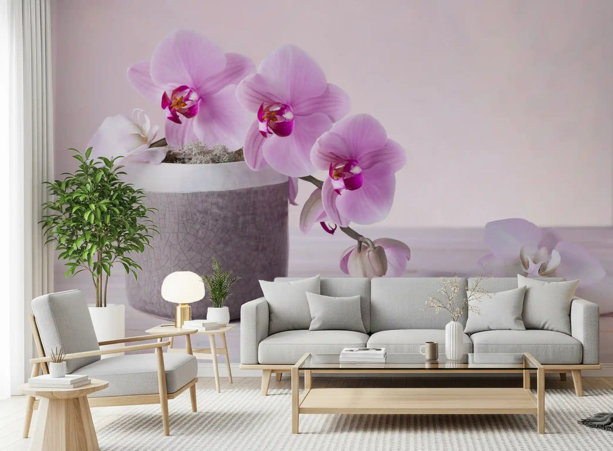 Pink orchid mural in a bright living room with a gray sofa and light wood coffee table GD13139